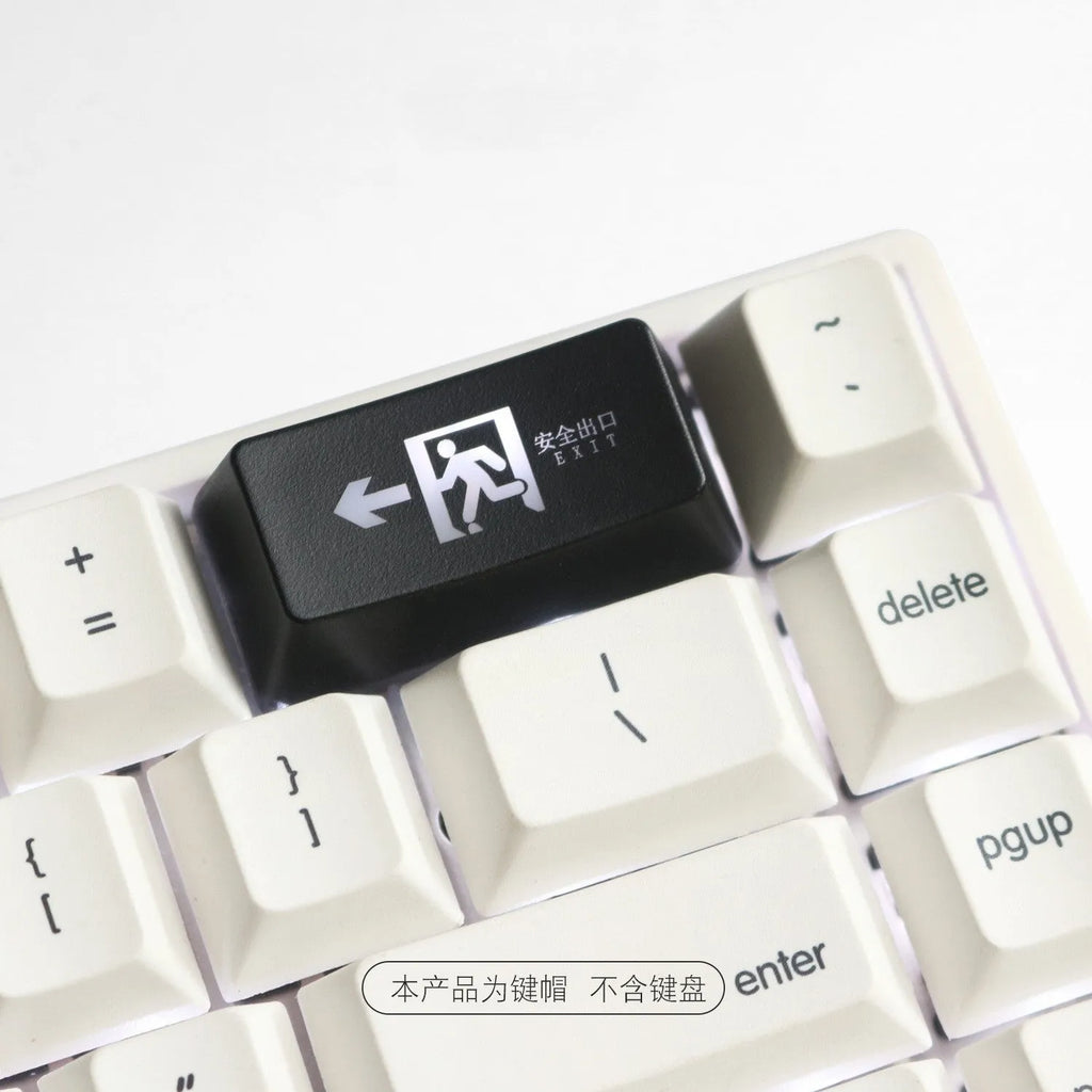 Transparent mechanical keyboard key cap with red safety evacuation exit symbol for backspace key.