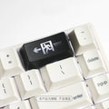 Transparent mechanical keyboard key cap with red safety evacuation exit symbol for backspace key.