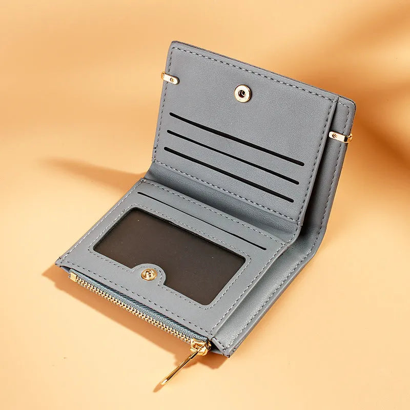 Ladies folding wallet with zipper closure showing multiple internal card slots and compartments