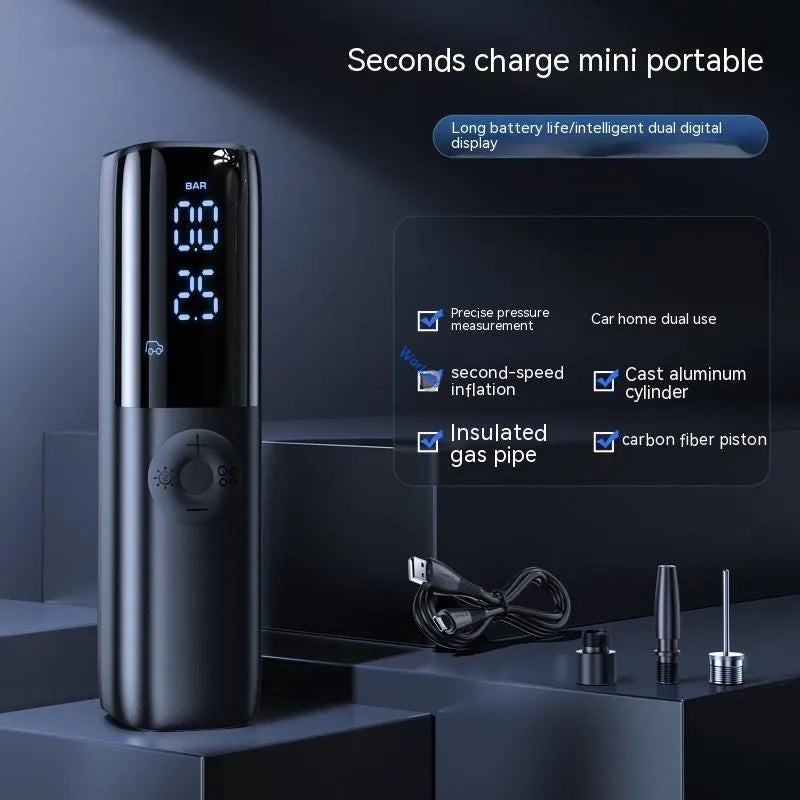 Black portable electric car air pump with plug-in connector and tyre pressure gauge