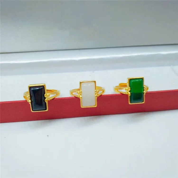 Adjustable brass gold-plated ring with electroplated gemstone in black, green or white options