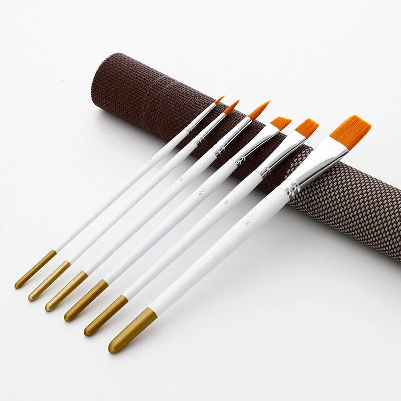 Set of six acrylic watercolour paint brushes with wood handles on a white background.