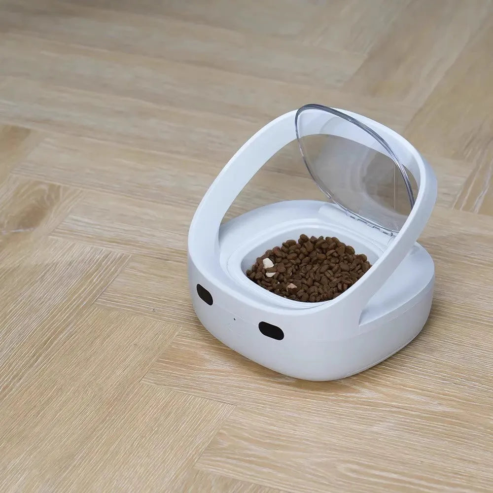 White NutriCare smart cat feeder with anti-stealing collar, food bowl, ice box, and charging cable set