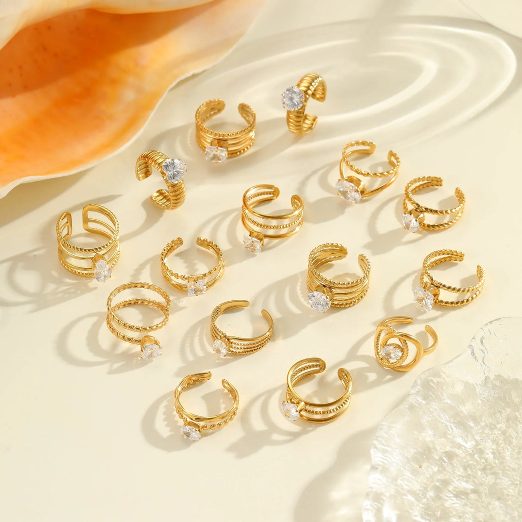 Gold electroplated stainless steel ring with geometric heart shape design and zircon accents
