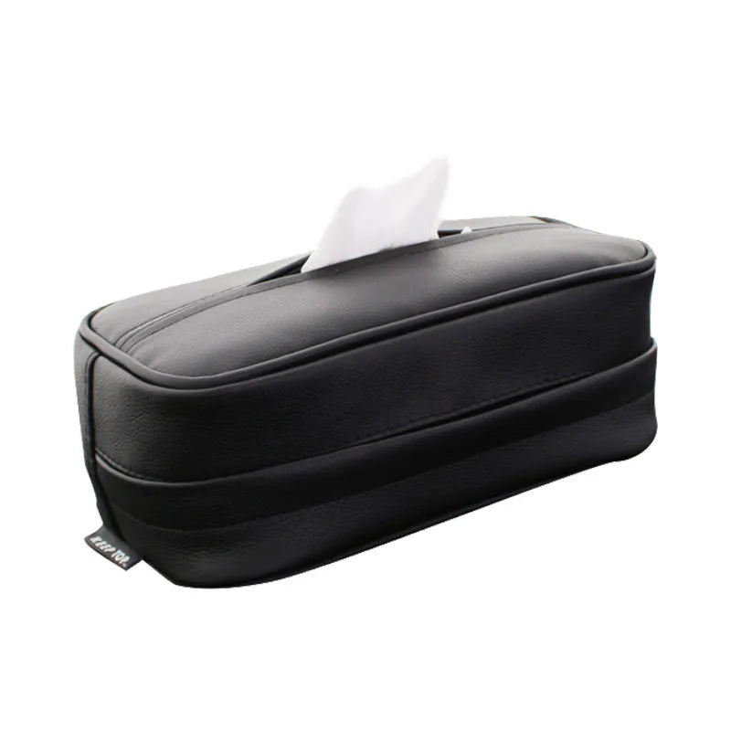 Black leather car hanging storage box with open top, shown next to a beige medium-sized version.