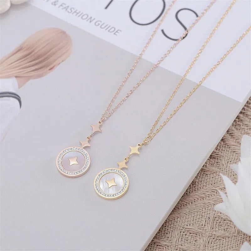 Gold titanium steel necklace with a geometric six-pointed star pendant on a chain.