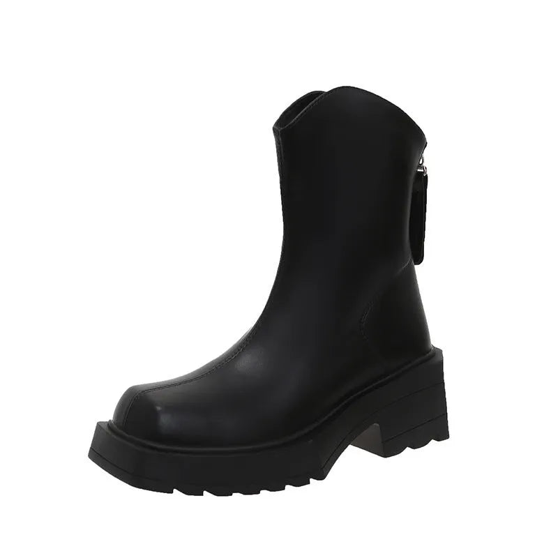 Black women's platform Martin boots with square toe, high heel, and back zip on a white background.