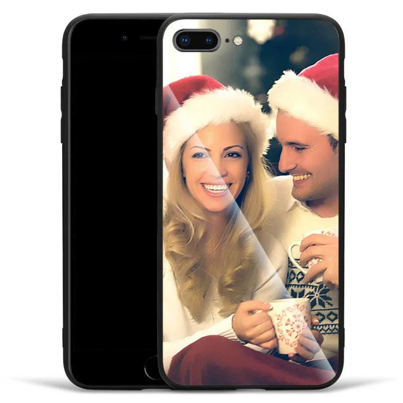 Slim patterned iPhone case with raised edges protecting a smartphone.