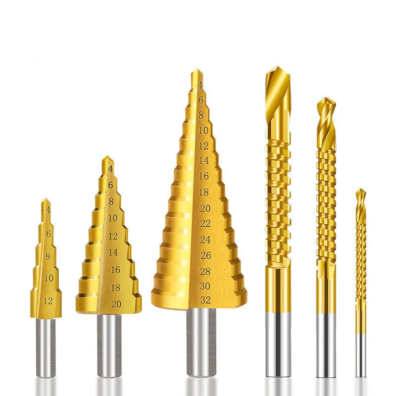 Cone-shaped step drill bits and a centre punch from a high-speed steel tool set on a workshop bench.