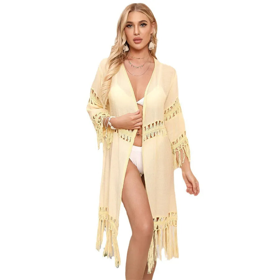 Women's hand-crocheted acrylic beach cover-up cardigan with tassel detailing in yellow colour