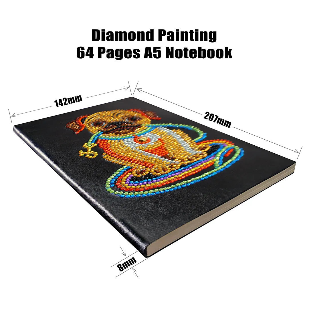 Black hardcover A5 diamond painting notebook with 50 cream pages open on craft table