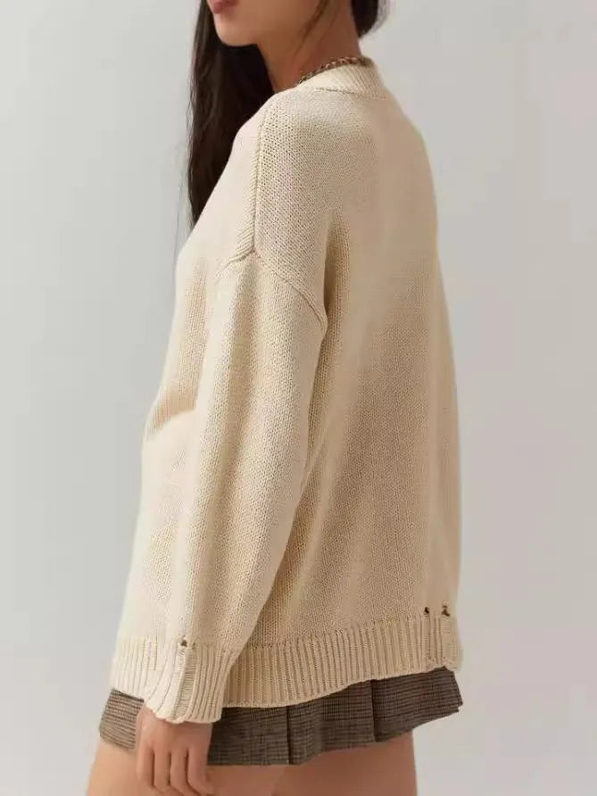 Women's milky white acrylic jacquard knit sweater with round neck and long sleeves