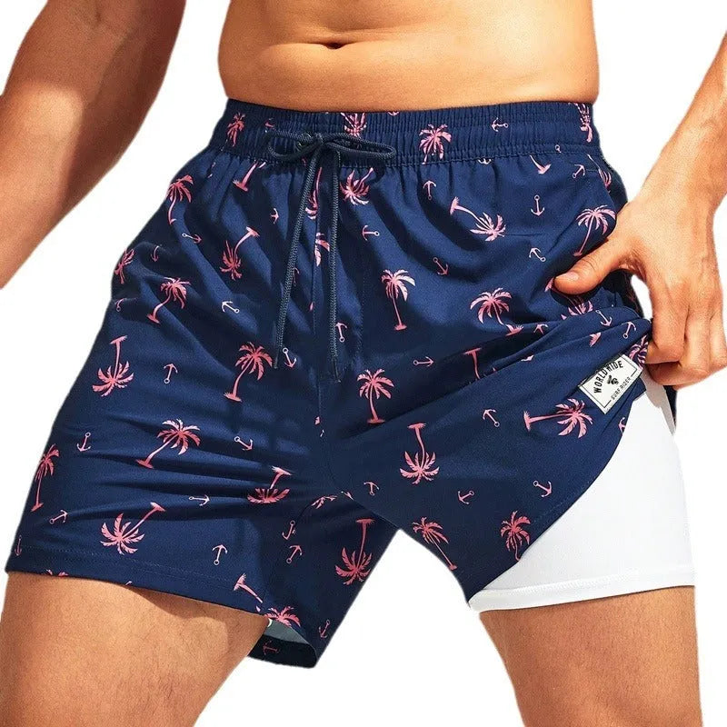 Men's loose quick-drying swimming trunks in floral pattern with boxer-style cut