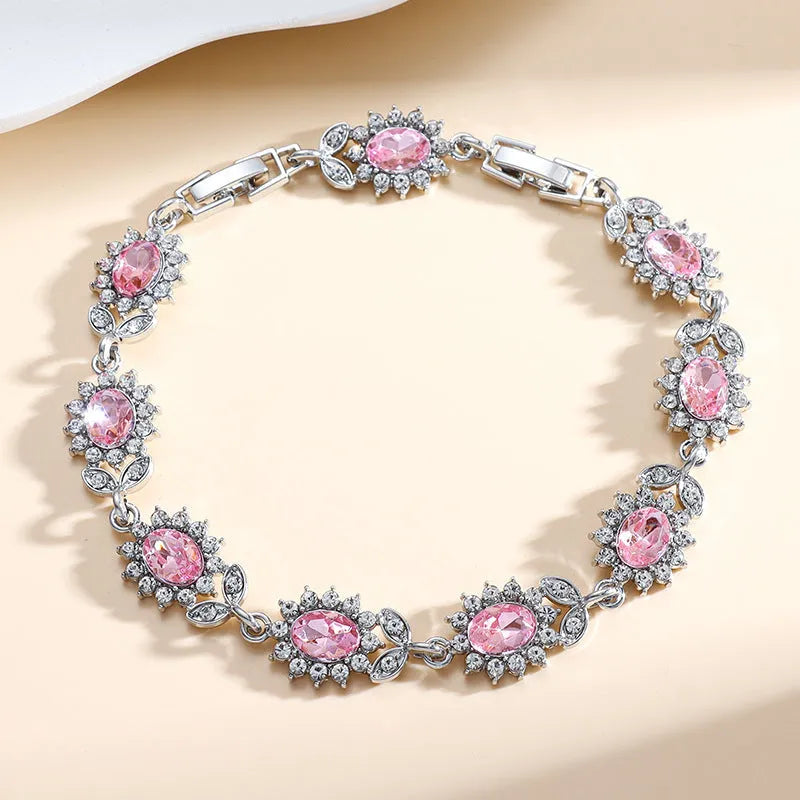 Women's simple bracelet with inlaid zircon gemstone on an electroplated environmentally friendly alloy band.