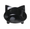 Shallow black melamine cat food bowl with anti-skid rubber base on wooden floor