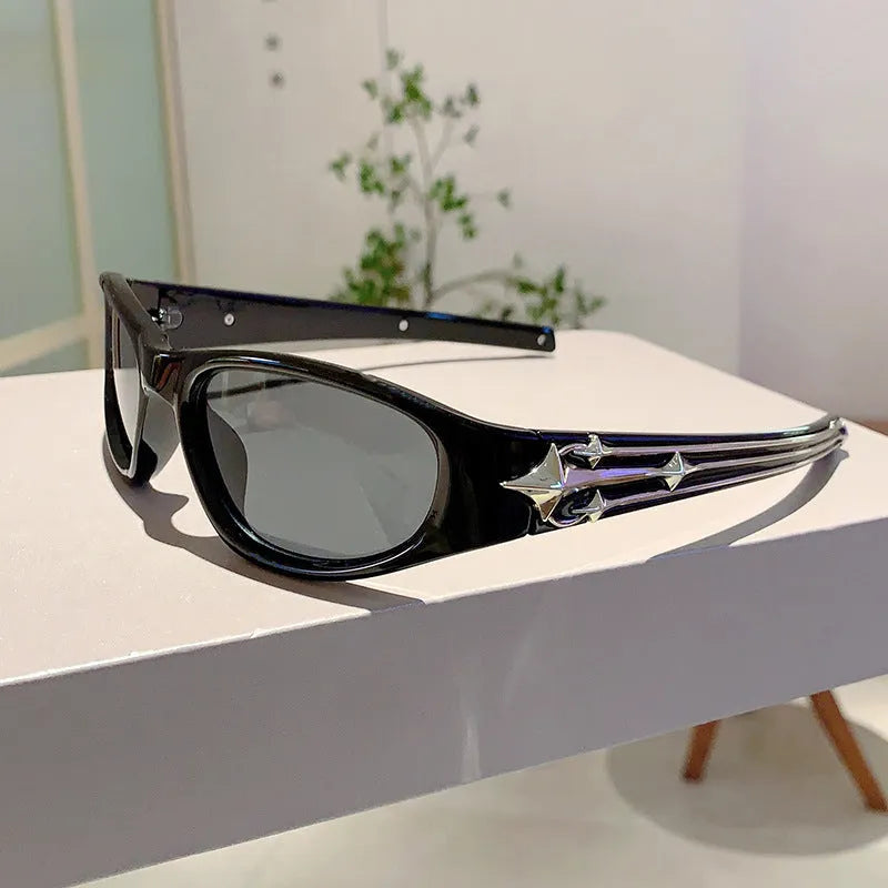 Sports sunglasses with a polycarbonate frame and lenses, shown in a choice of colours including black, red, and transparent gray.