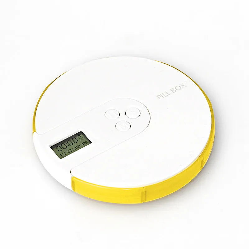 Blue 7-compartment alarm clock pill dispenser showing timer display and storage sections