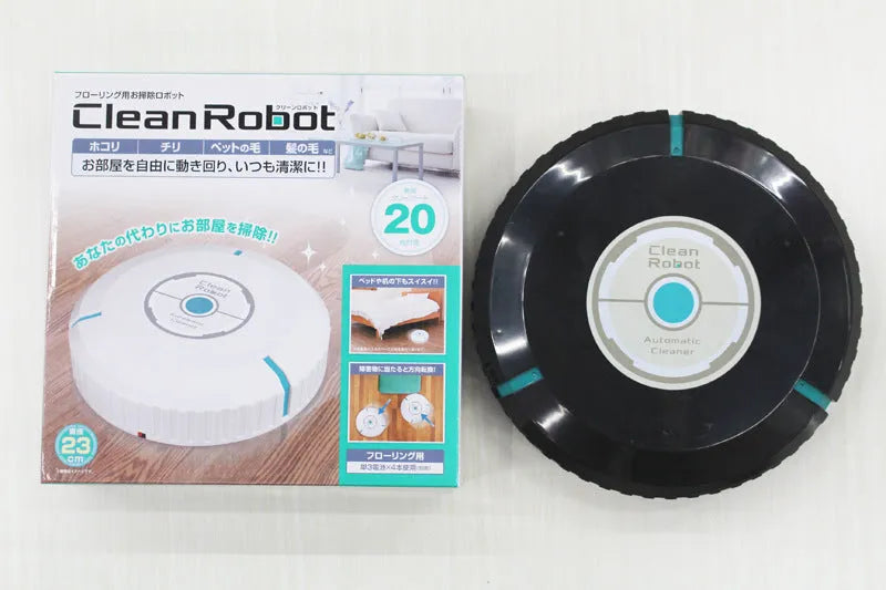 Black or white AC robot vacuum cleaner on a wooden floor showing its 23-inch square size and low profile.