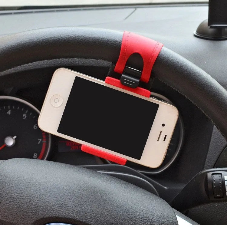 Black universal steering wheel phone holder clip for smartphones showing silicone pad