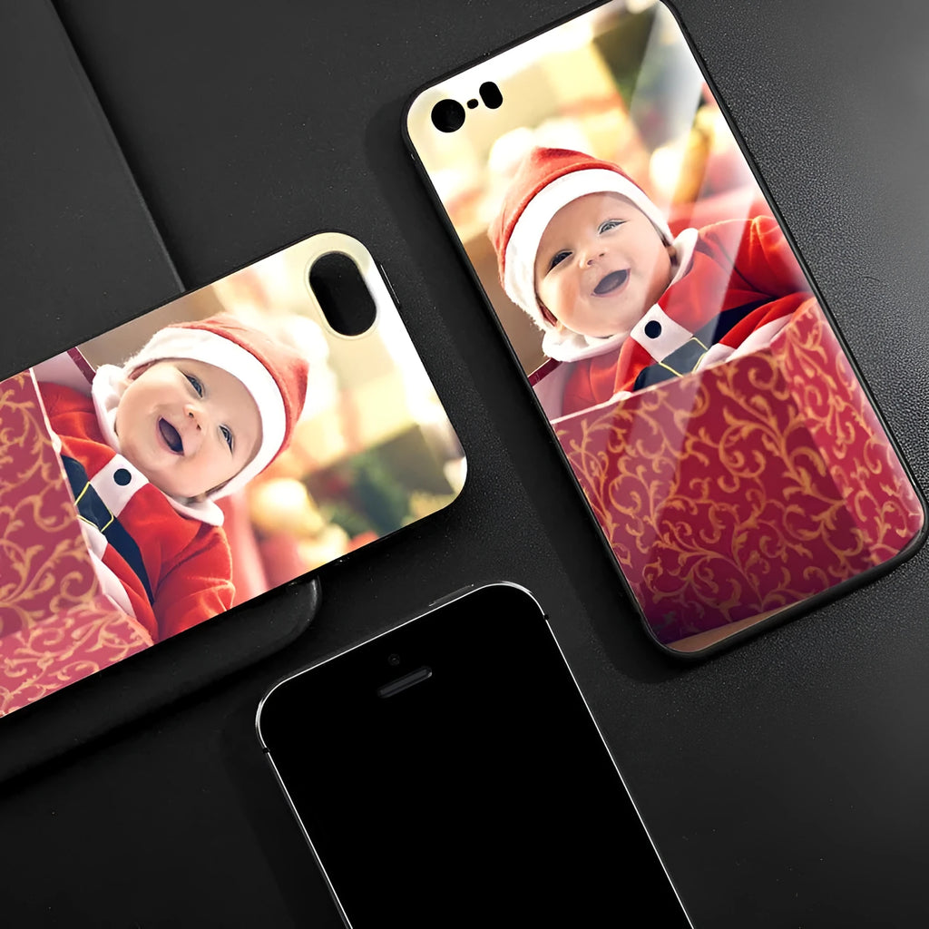 Slim patterned iPhone case with raised edges protecting a smartphone.