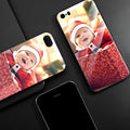 Slim patterned iPhone case with raised edges protecting a smartphone.