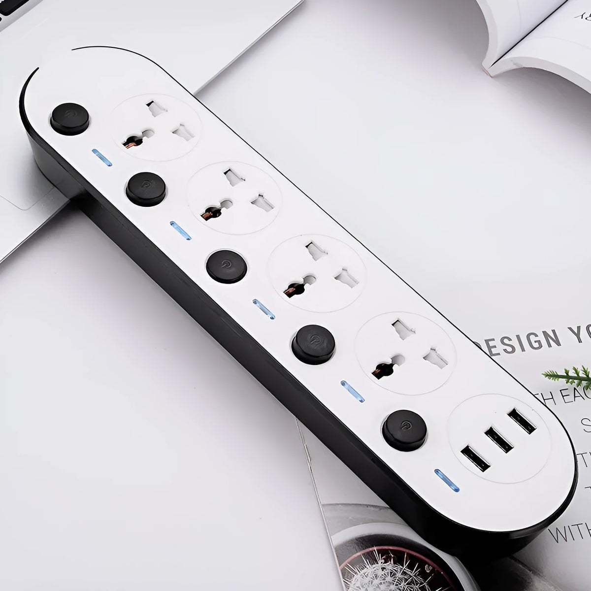 International power strip with sockets for UK, US, EU and AU plugs, a switch, and USB ports.
