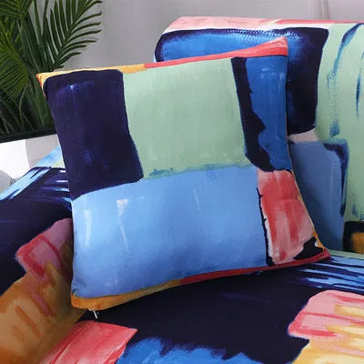 Geometric abstract print stretch sofa slipcover on a modern sofa