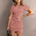 Women's casual midi dress with an irregular hemline, short sleeves, and a high waist, shown in a coloured cotton polyester fabric.