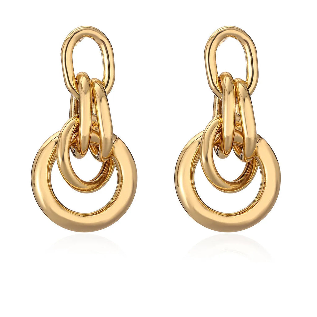 Gold-colour geometric earrings with irregular shapes and INS high-profile design