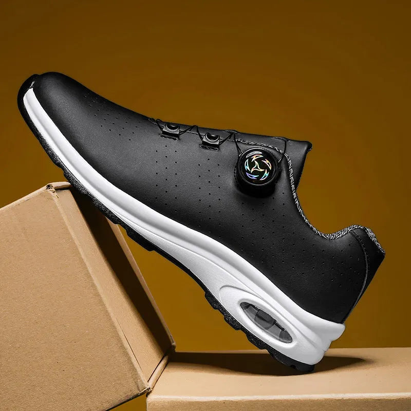 Men's black and white low-top casual tennis shoes with mesh uppers and composite soles