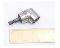 Silver turning screwdriver with a 105-degree flexible shaft and magnetic quick-release handle for use in corners.