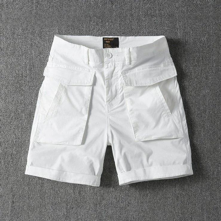 Men's straight-leg cargo shorts in Army Green made from micro-elastic cotton fabric with multiple pockets.