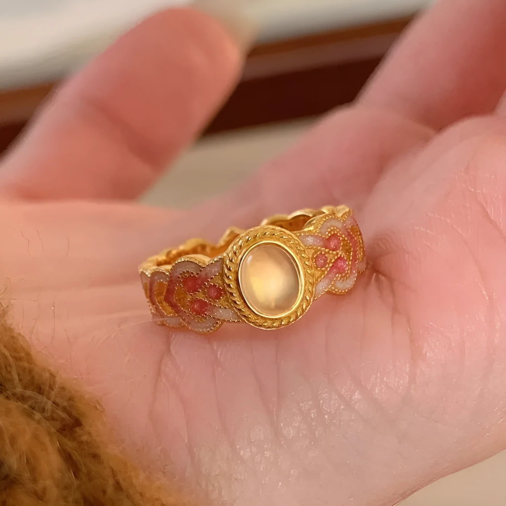 Women's pink crystal enamel adjustable ring with geometric open design on gold-plated copper