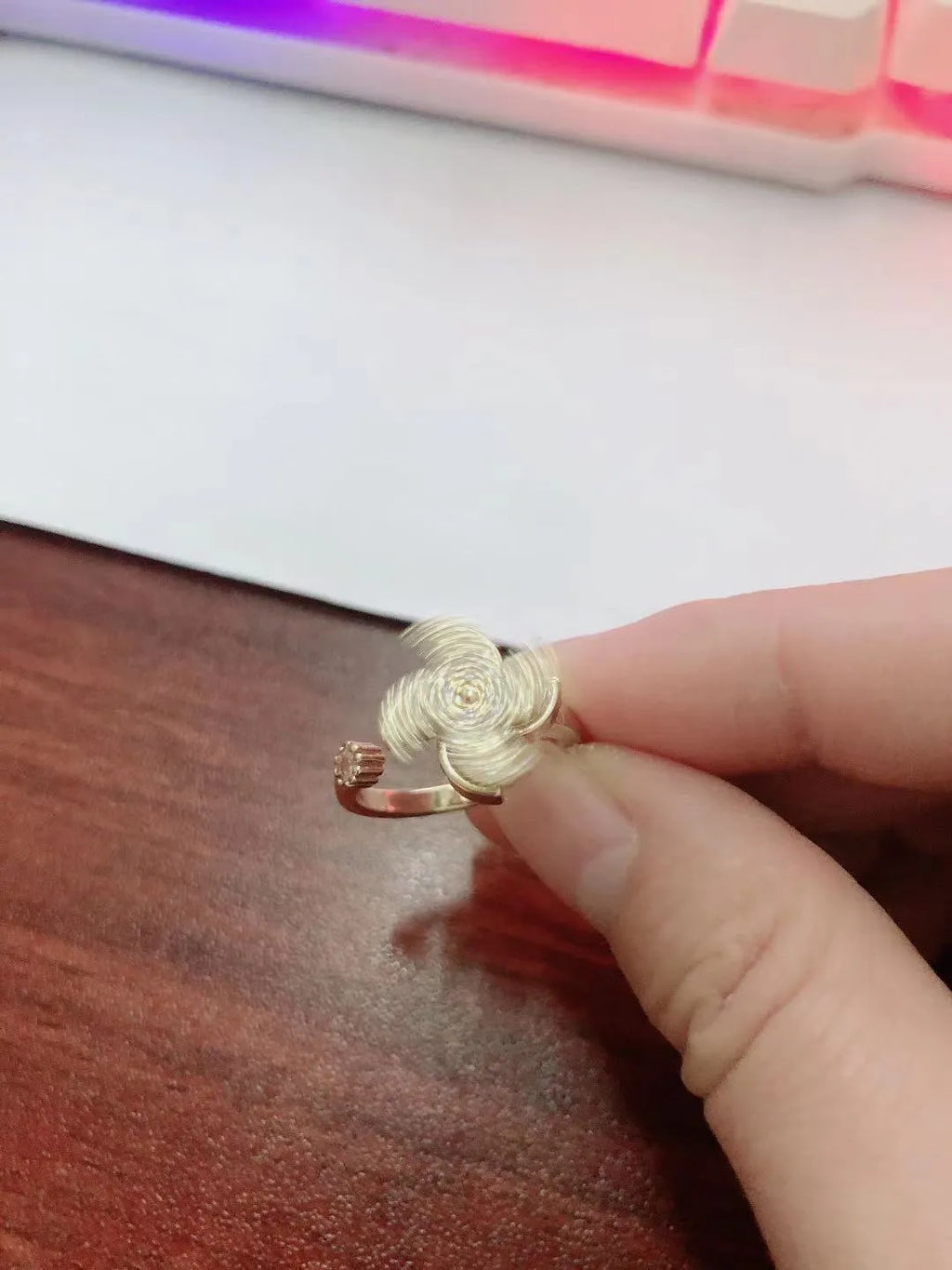 Copper micro inlaid rotating ring with geometric windmill design in gold or silver finish