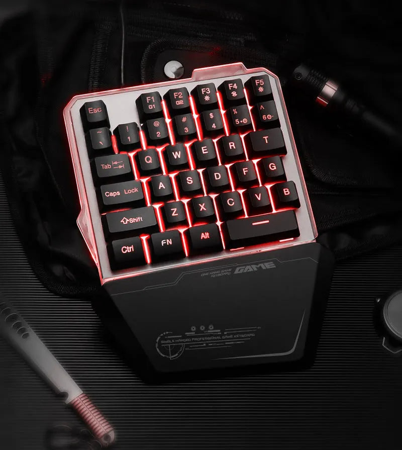 Black G40 Flow Colour one-handed mechanical gaming keyboard with RGB backlit keys on a desk