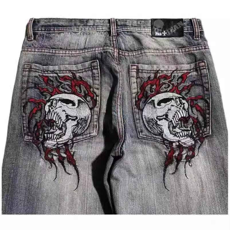 Grey washed-out wide-leg denim jeans for men with a retro workwear design and straight leg opening.