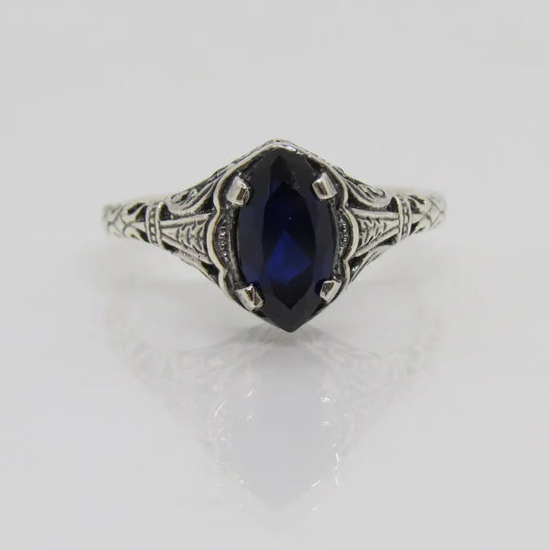 Silver geometric hollow alloy ring with zircon detailing shown in women's sizes 5 to 11