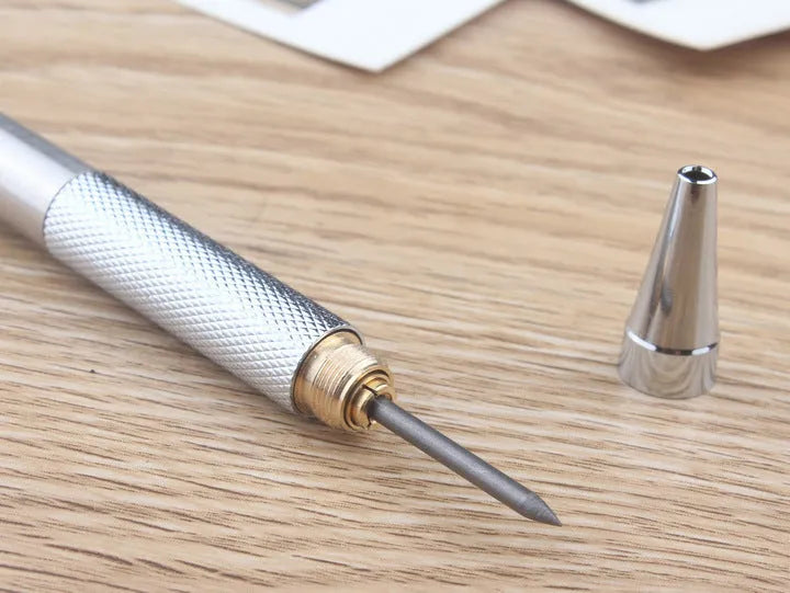 Metal automatic mechanical pencil with five lead size options displayed with 2B refills