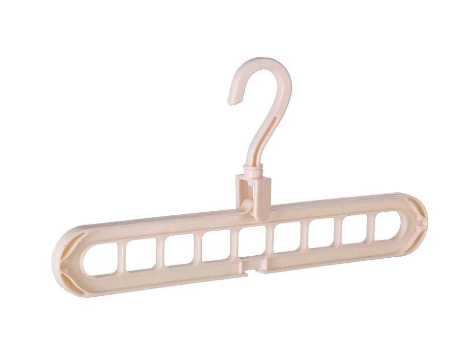 Pink or green heavy-duty plastic clothes hanger with rotating hook, shown holding a coat.