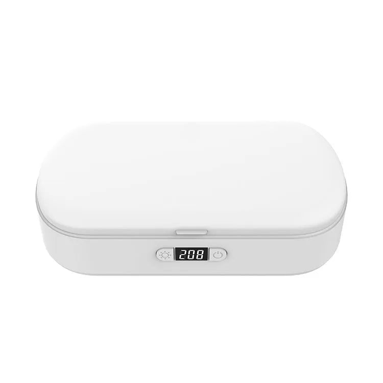 White aromatherapy UV steriliser box with wireless charging for mobile phones and small personal items
