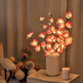 Pink LED Phalaenopsis branch decorative light measuring 65cm with fabric and plastic shell