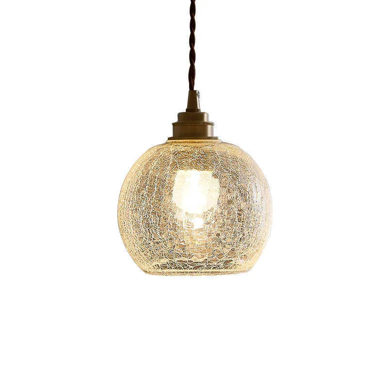 Retro brass chandelier with glass ball shade measuring 17.5 by 15 centimetres