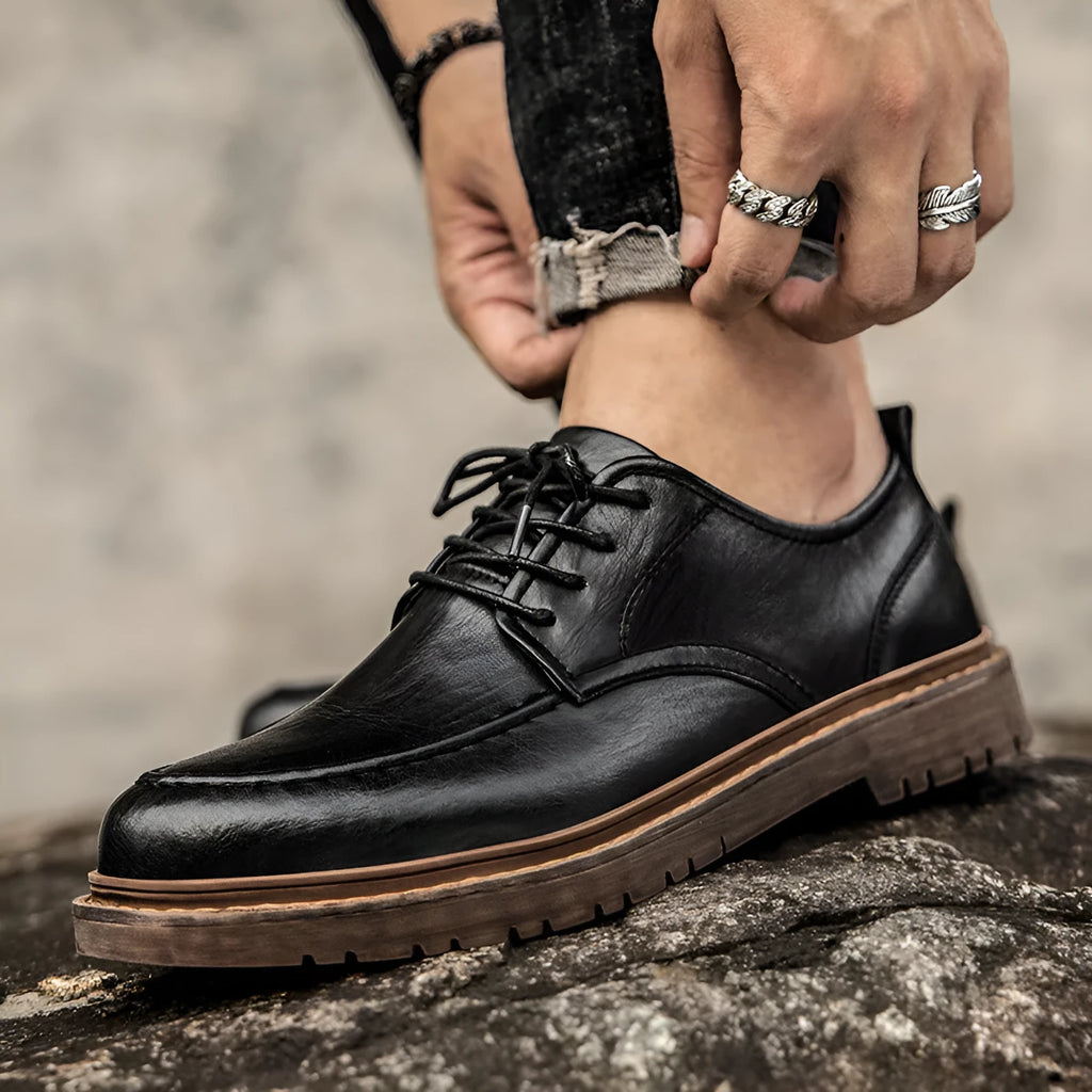 Men's black casual leather shoes with round toe, low-top design and decorative sewing lines