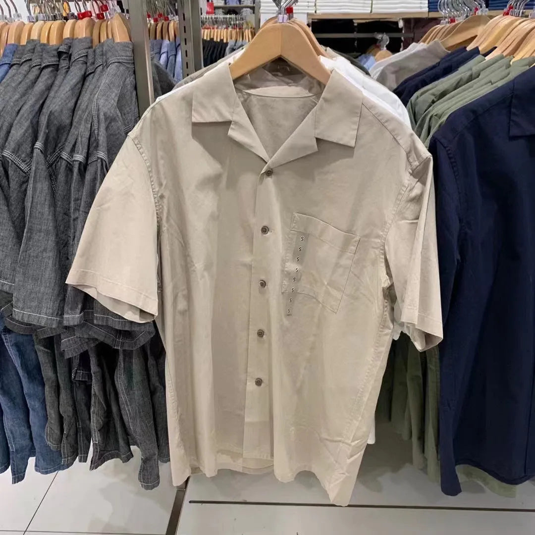Men's beige modal cotton open collar casual shirt with regular sleeves on a hanger.