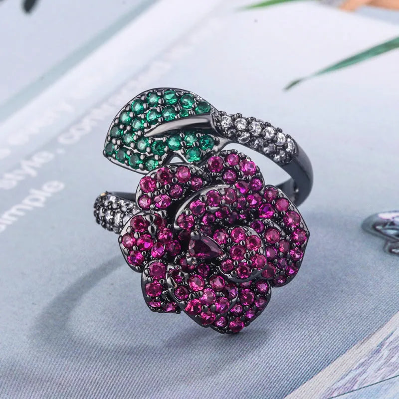 Geometric black gold personality ring with red corundum stones