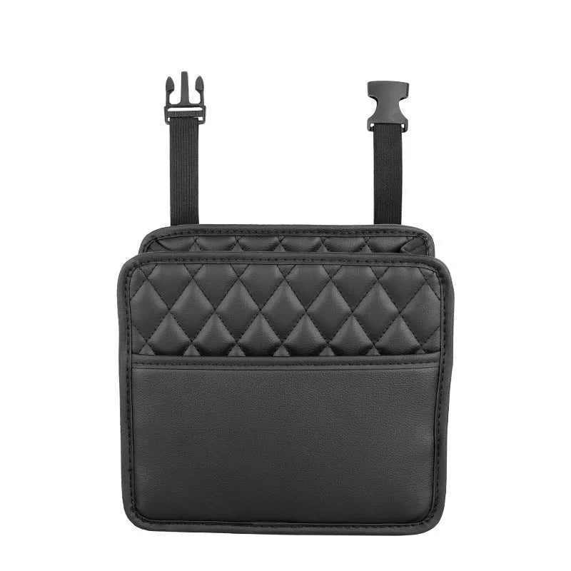 Black leather hanging storage bag for car interior, shown mounted on a headrest.