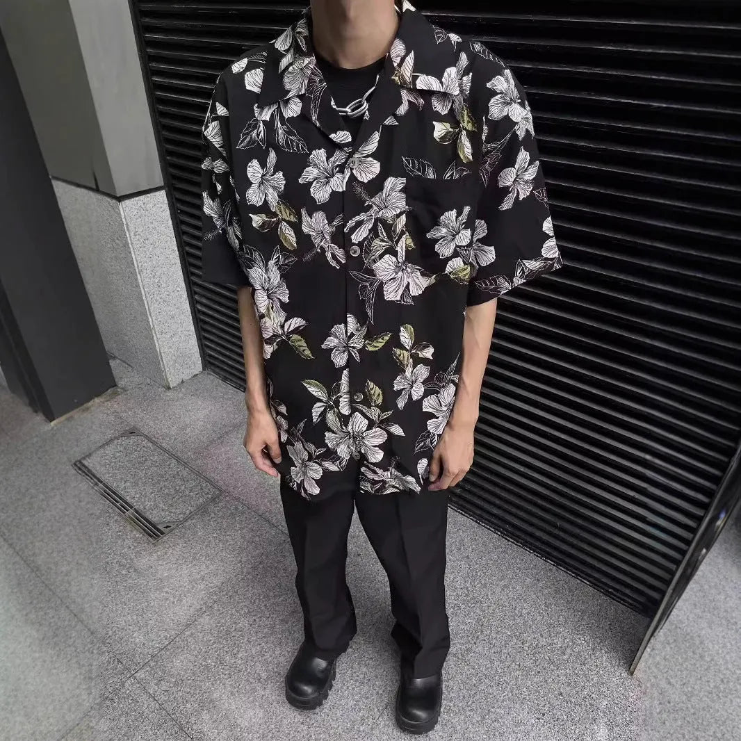Black men's vintage Cuban collar shirt with floral print, made from ice silk fabric with short sleeves.