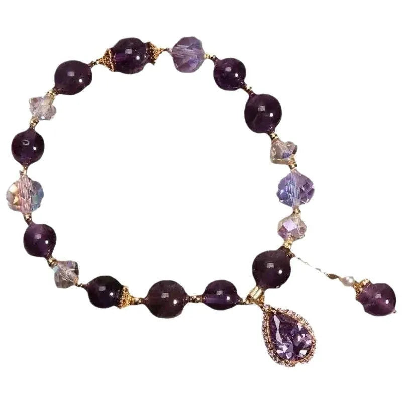 Close-up of a women's bracelet with natural purple amethyst stones set using micro inlay craftsmanship.