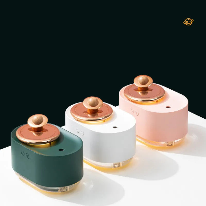 Rotating planet USB humidifier with night light in green colour showing mist output