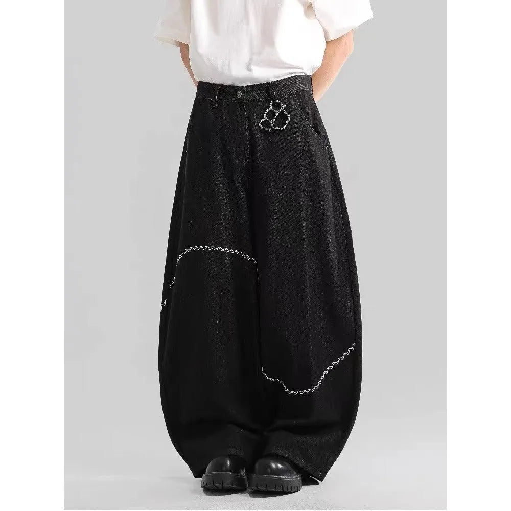 Black straight-leg men's trousers with mid-waist design and zip fly placket in micro-elastic polyester denim fabric